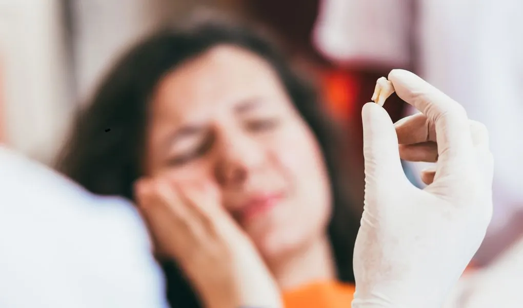 après une extraction dentaire